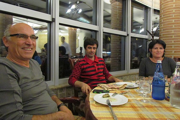 Dini, Mersin and Arta enjoy dinner