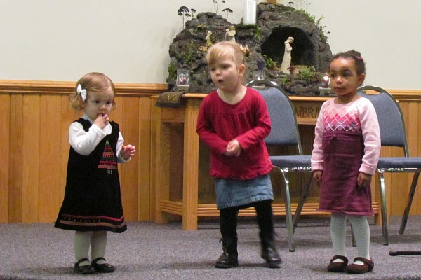 Syndney leads her group of girls in their recitation at the Christmas program