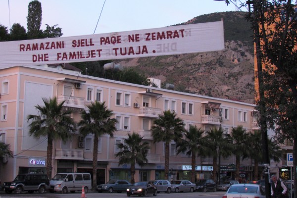 banner over city street at the beginning of Ramadan