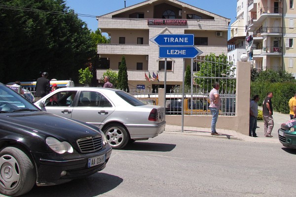 new signs pointing to Tirana and downtown Lezhe