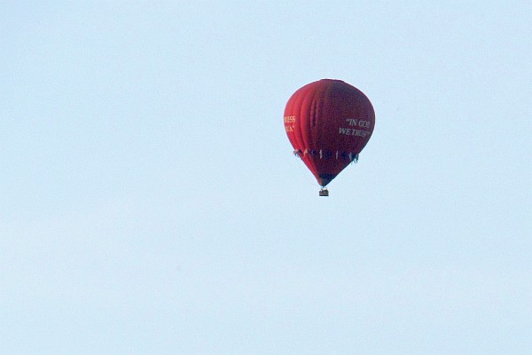 a hot air balloon rose over the tree as a symbol of Janet's spirit rising to be with God
