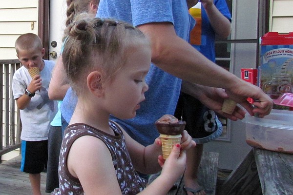 Sydney and Ty value enjoy their ice cream cones