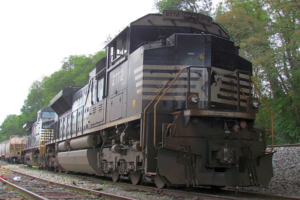 two Norfolk Southern train engines ready to pull a train