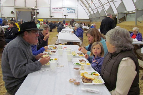 eating a Friday supper with family at the Va. Mennonite Relief Sale