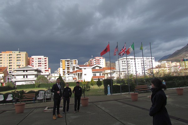 dark clouds and sunlit buildings in Lezhe