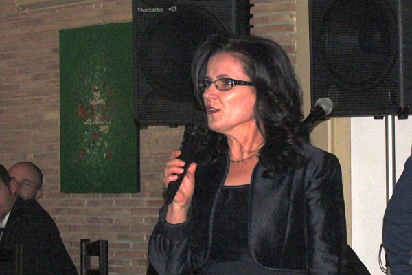 Klementina gives her speech at the fundraiser
