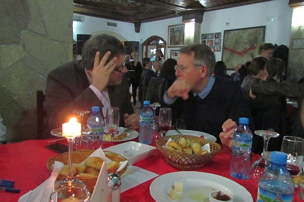 Phil Moyer and a professor from New York U. in Tirana talk