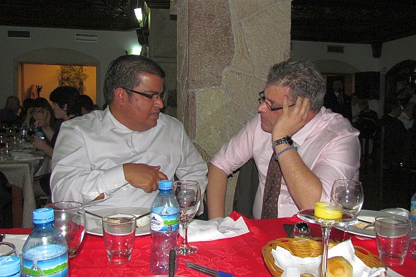 two profs from the NYU in Tirana converse