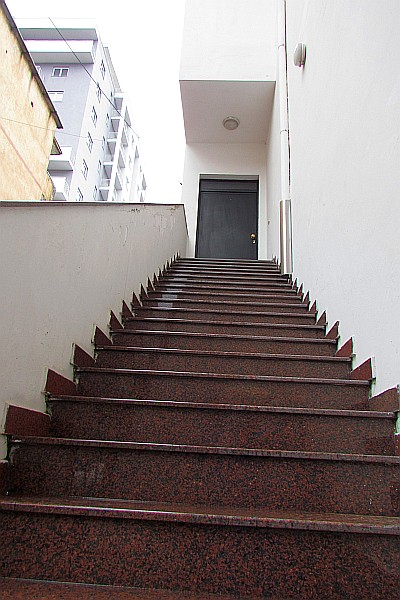outsidde stairs to get to the door to go inside