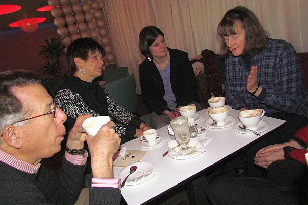 several persons meet for coffee before church