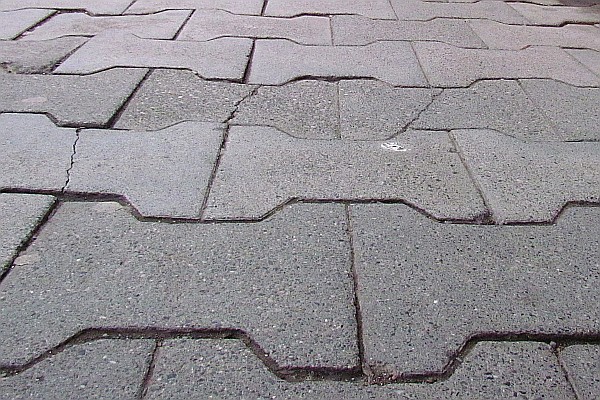 interlocking concrete tiles make up some sidewalks (II)