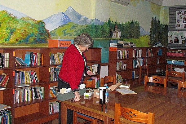Elsie works in the library