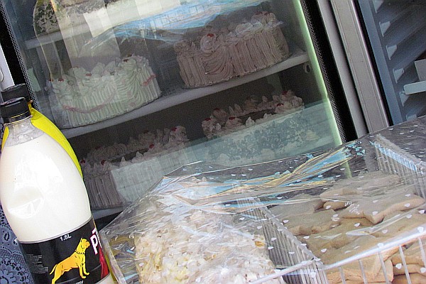 shop selling cookies, cakes and milk in re-used bottles