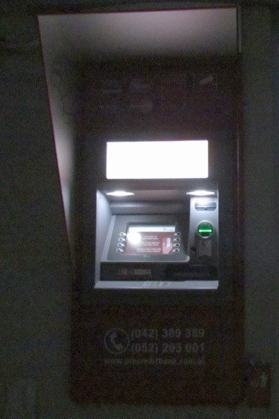 an ATM in the evening
