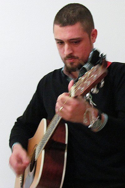 Rafael plays the guitar