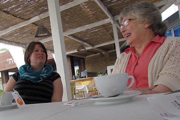 Laura and Elsie enjoy coffee and conversation