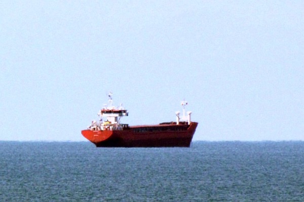 a cargo ship anchored at the port
