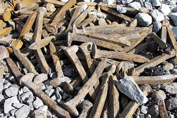 pile of old rail spikes