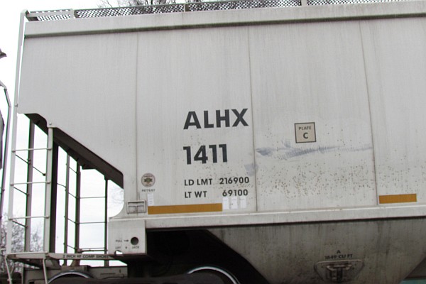 showing the ALHX 1411 number on the covered hopper car