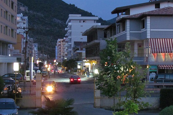 looking down Rruga Shtraus as night falls