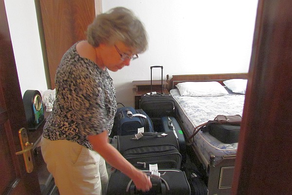 Elsie surveys our suitcases