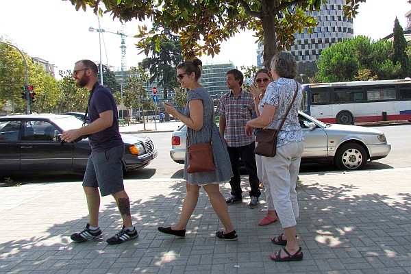 crossing at a crosswalk in Tirana