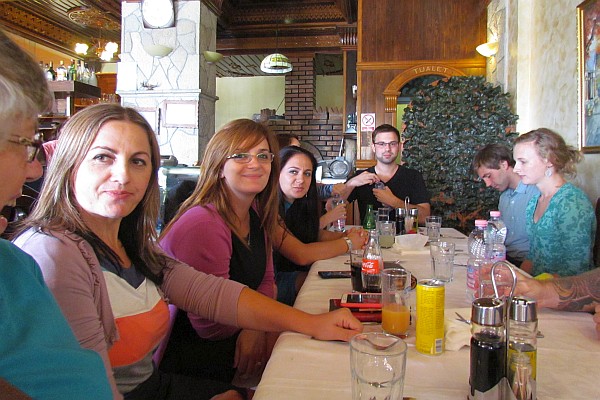 teachers eating pizza at Marku's