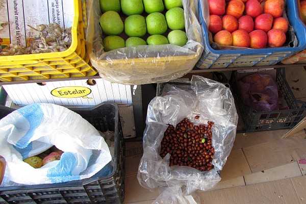 the scene at a fruit and vegetable stand