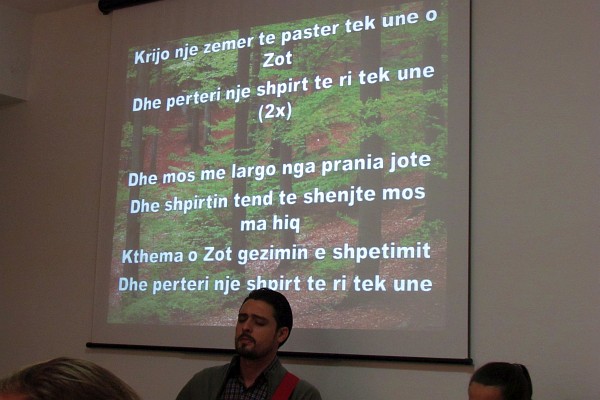 a praise song in Albanian