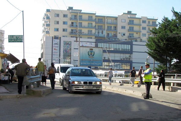 the intersectin at the bridge next to the market