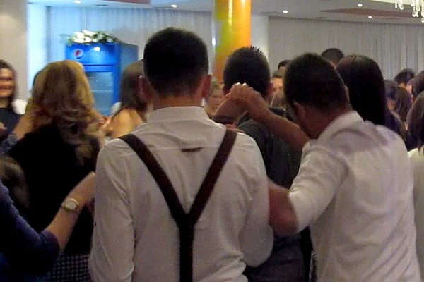 all ages ansd genders dance in circles