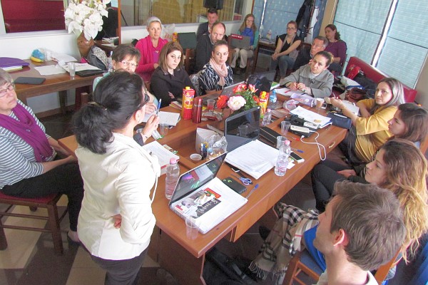 Klementina leads the faculty meeting