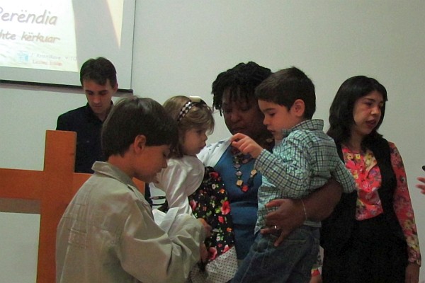 Norma enjoys children at church