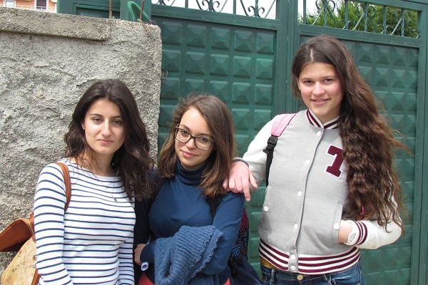 three students at end of school day