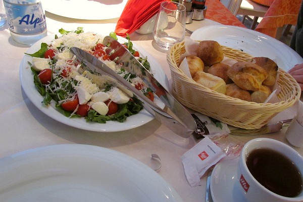 a salad and muffins at Jolly's Bar
