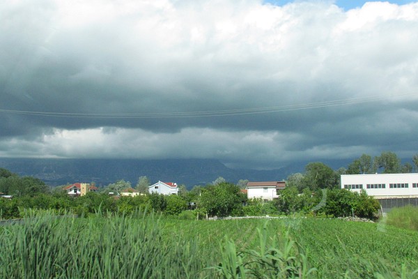 dark clouds playing over the fields