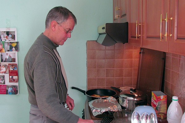 Allen cooking a meal for us