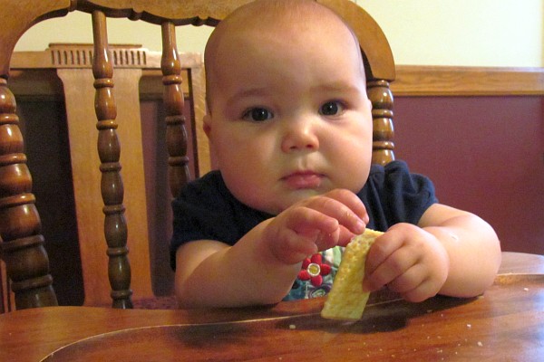 Kiara in her high chair