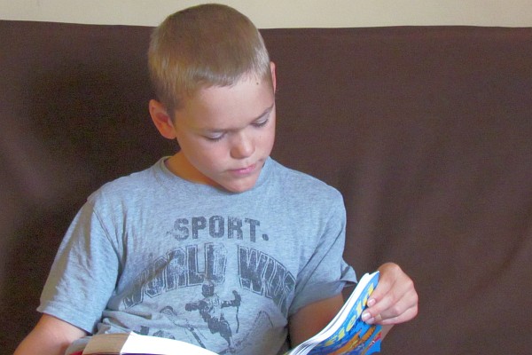 Nathan is engrossed in a book
