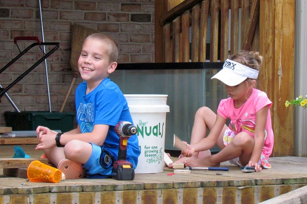 Caleb and Naomi work on projects