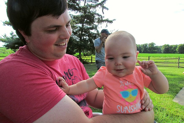 Holden holds a happy Kiara