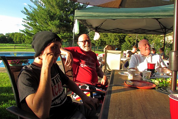 several persons sitting at one table for conversation