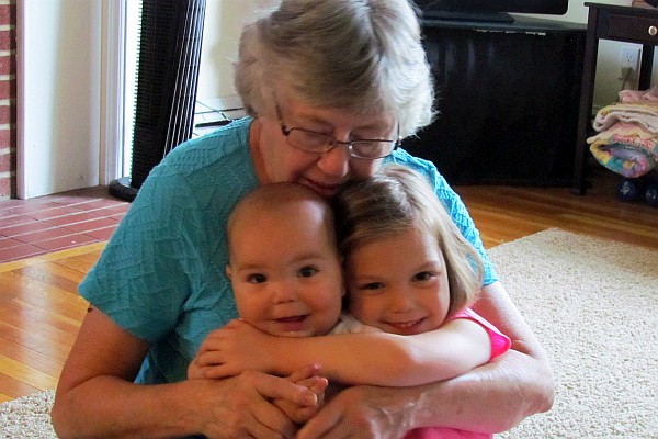 Elsie holds Kiara and Sydney