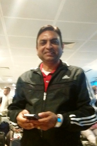 waiting passenger--a farmer from India