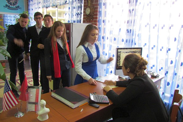 Mona signs students up for lunch at LAC