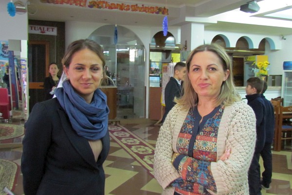 Sonila and Ina share a moment after school