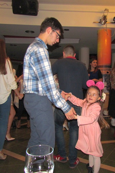 senior Gladys and his little sister share a dance