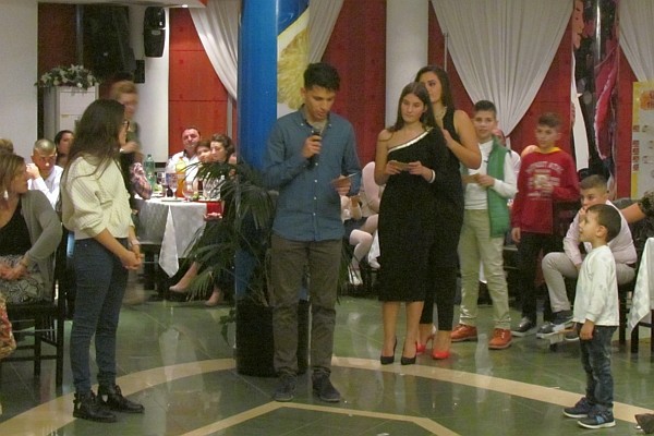 student government members read a poem by Inda