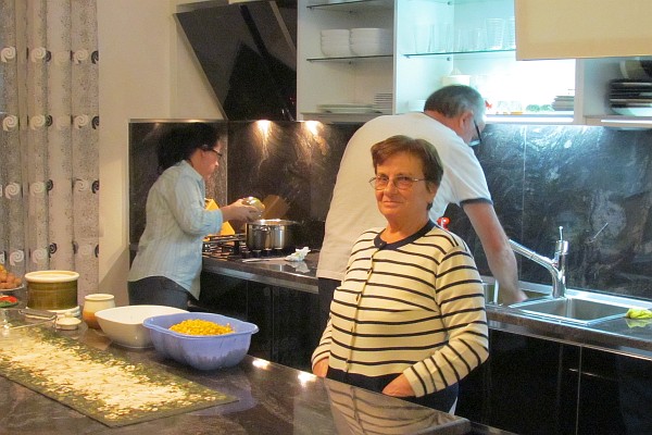 the Shahini's work on preparing the meal
