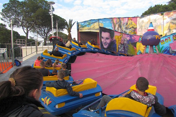 a car ride at the fair in the parking lot at the Polytechnic University